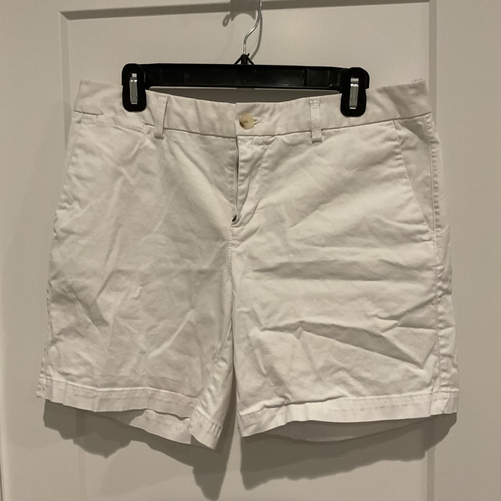 White medium length shorts